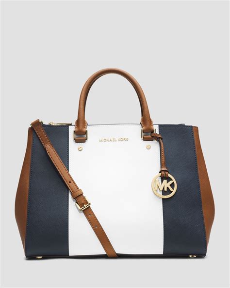 michael kors navy blue striped bag|Michael Kors blue leather bag.